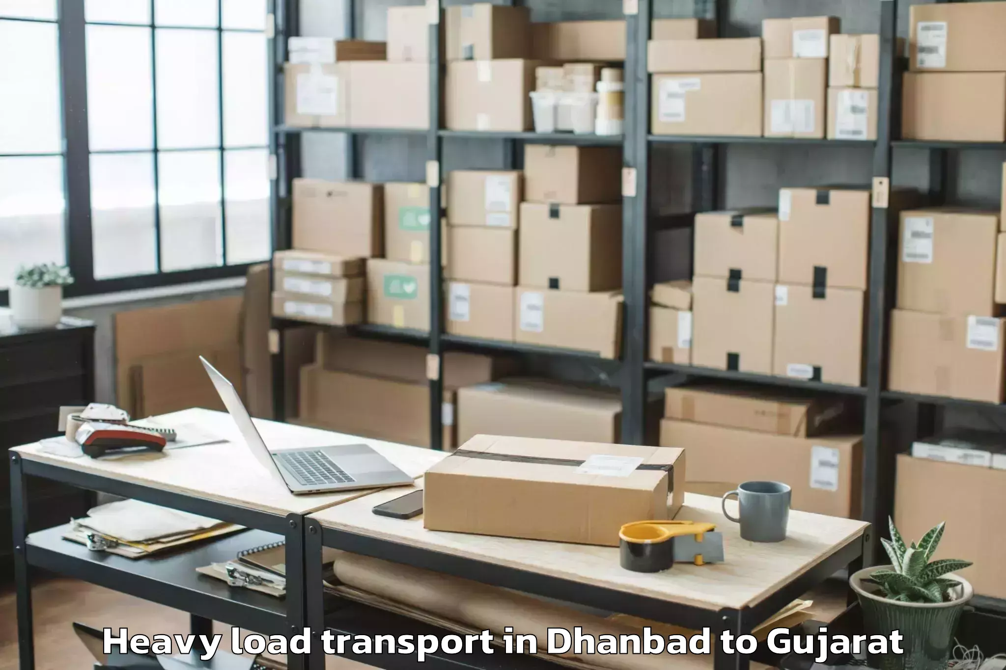 Easy Dhanbad to Valod Heavy Load Transport Booking